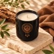 Mahonie Céramique : Musk & Leather Candle, elevated view on pale natural stone.