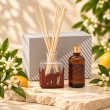 Mahonie L'étoile Reed Diffuser Set - Neroli, three-quarter view on pale natural stone.