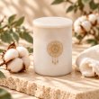 Mahonie Marbella : Egyptian Cotton Candle, three-quarter view on pale natural stone.
