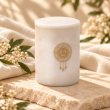 Mahonie Marbella : Regal Cashmere Candle, three-quarter view on pale natural stone.