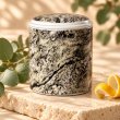Mahonie Métallique : Citric Eucalyptus Candle, closer view of its original materials and surface details.
