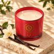 Mahonie Vanilla Candle, elevated view on pale natural stone.