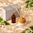 Mahonie Wabi Sabi Reed Diffuser Set - Lilly of the Valley, elevated view on pale natural stone.